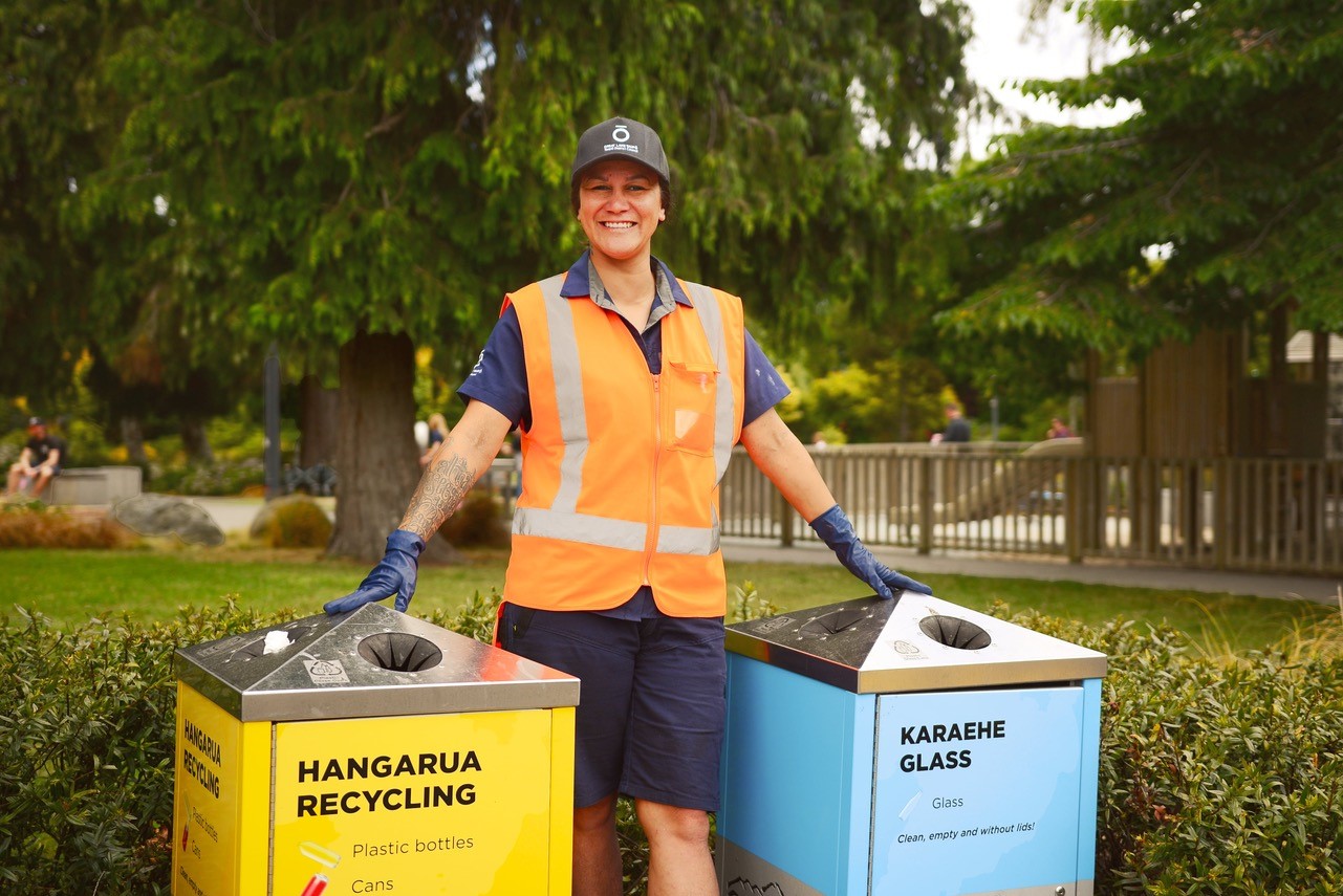 Kelsi, one of our awesome Environmental Rangers, next to a set of new bins.  