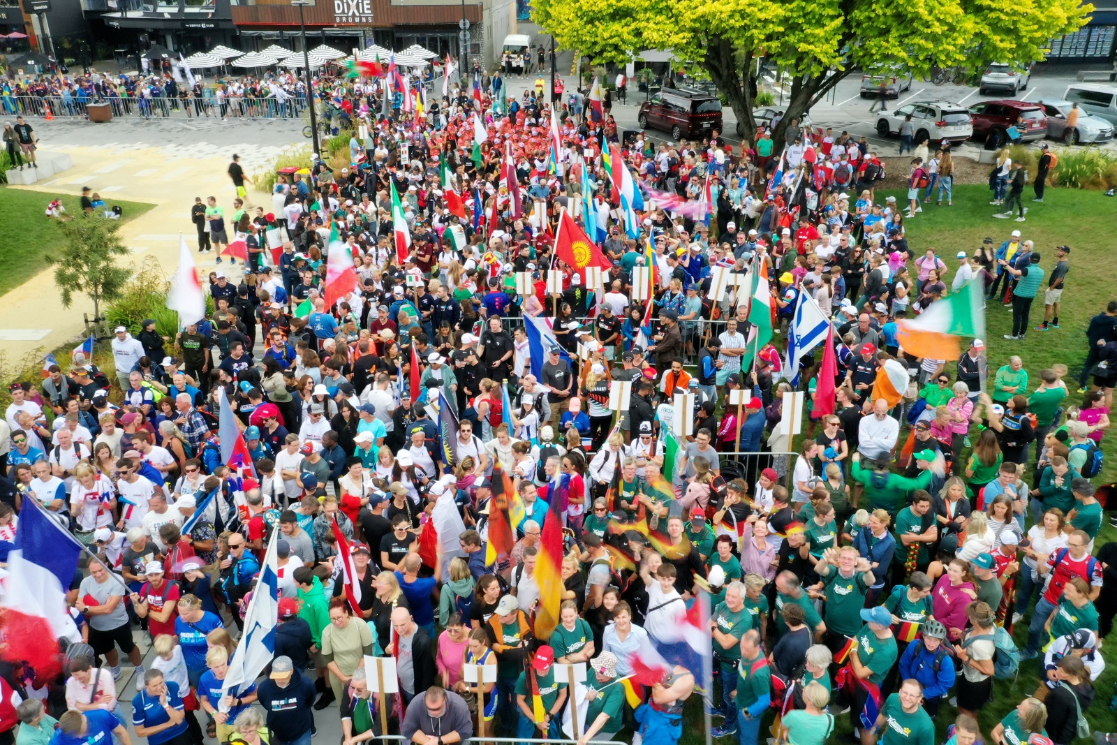 Parade with flags under way.  