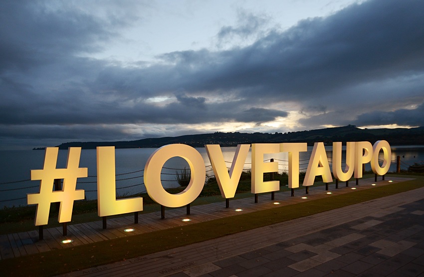 The LOVETAUPO sign will be lit up yellow.  