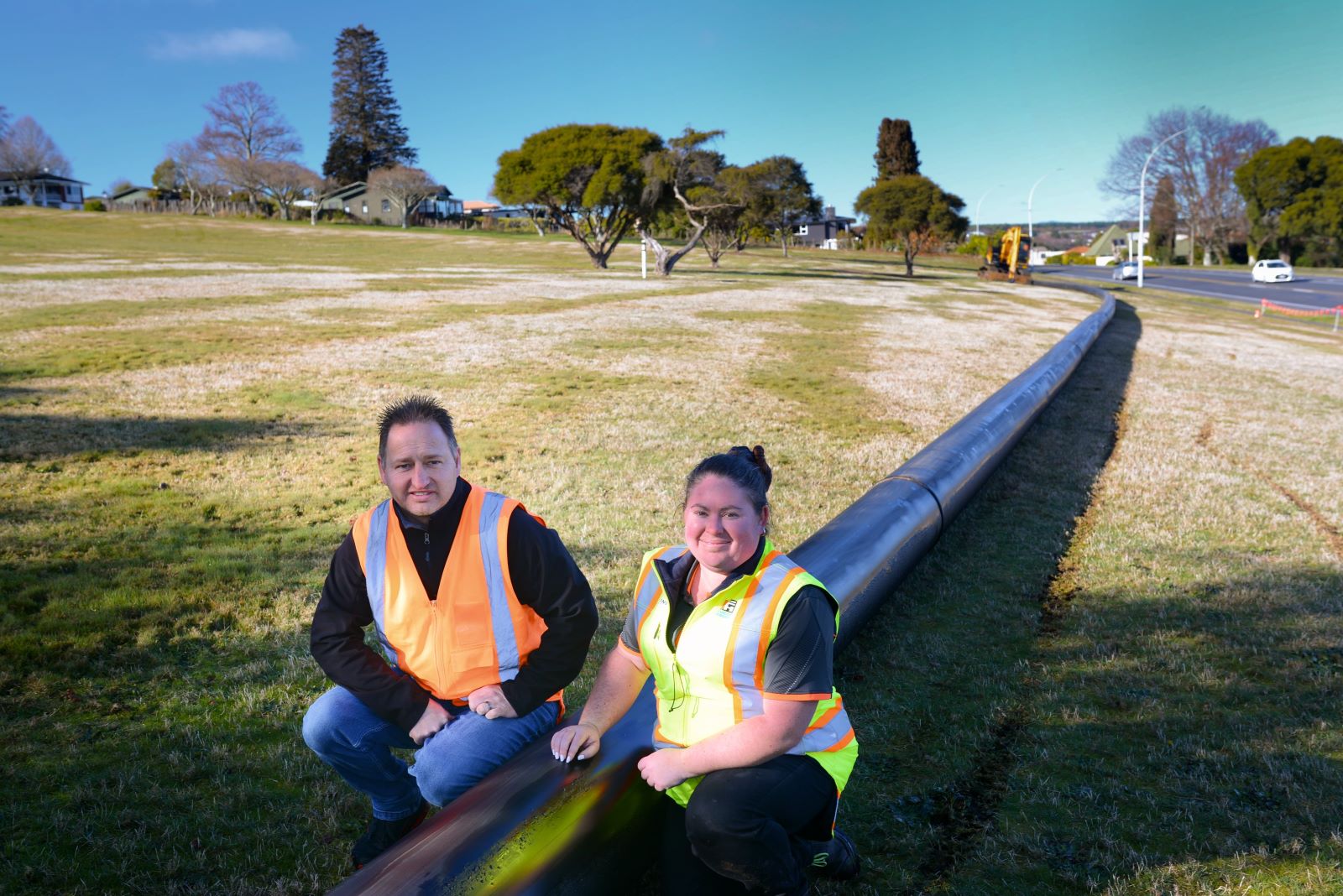 Project manager Peter van Niekerk and Nadia Whyte of Fulton Hogan with new sewer pipe.  