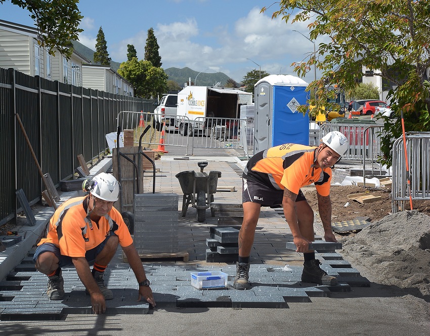 Paving stones being placed along Horomatangi Street.    